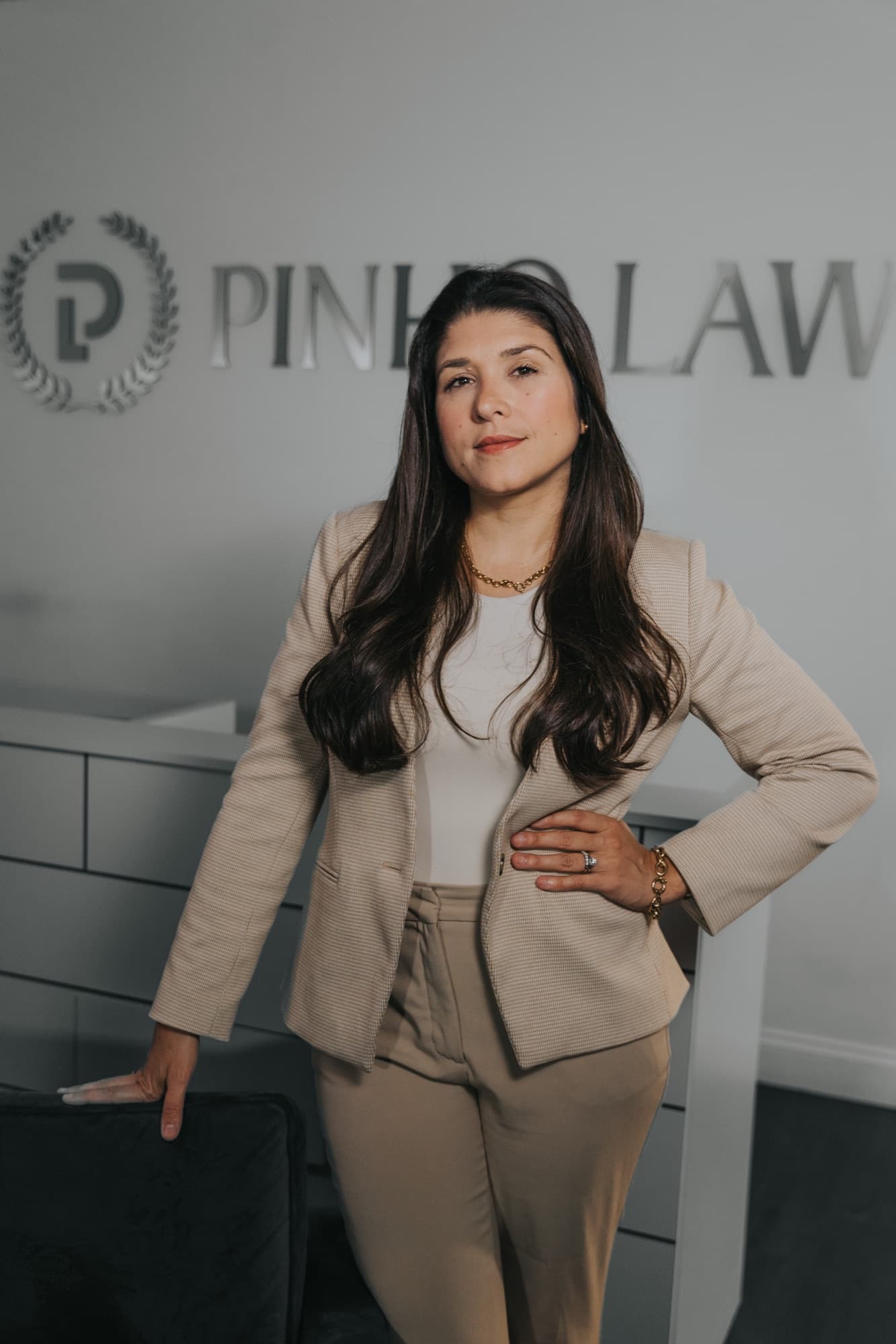 Dra. Izi Pinho, Esq. — Florida Bar #126610, AILA since 2019, Stetson Law magna cum laude (2016). Founder of Pinho Law.